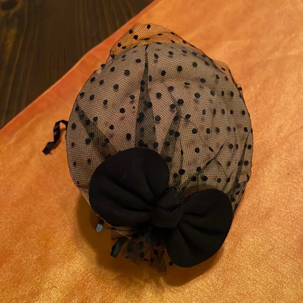 Black & Tan headband hat. Needs repair